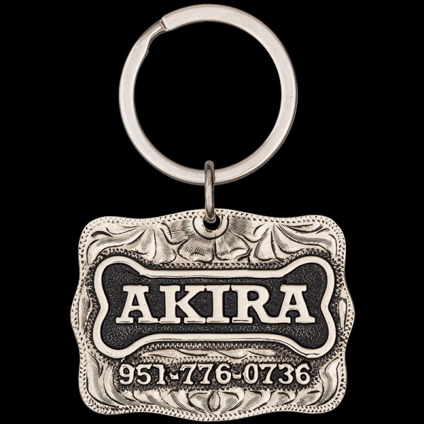 Meet the Akira Custom Dog Tag! Made with a German silver base, featuring delightful dog bone motifs and custom lettering. Keep your pet looking sharp and secure. Order yours today!